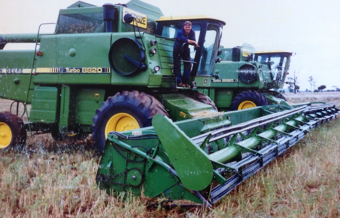 Vintage John Deere 8820 combines during an Australian harvest